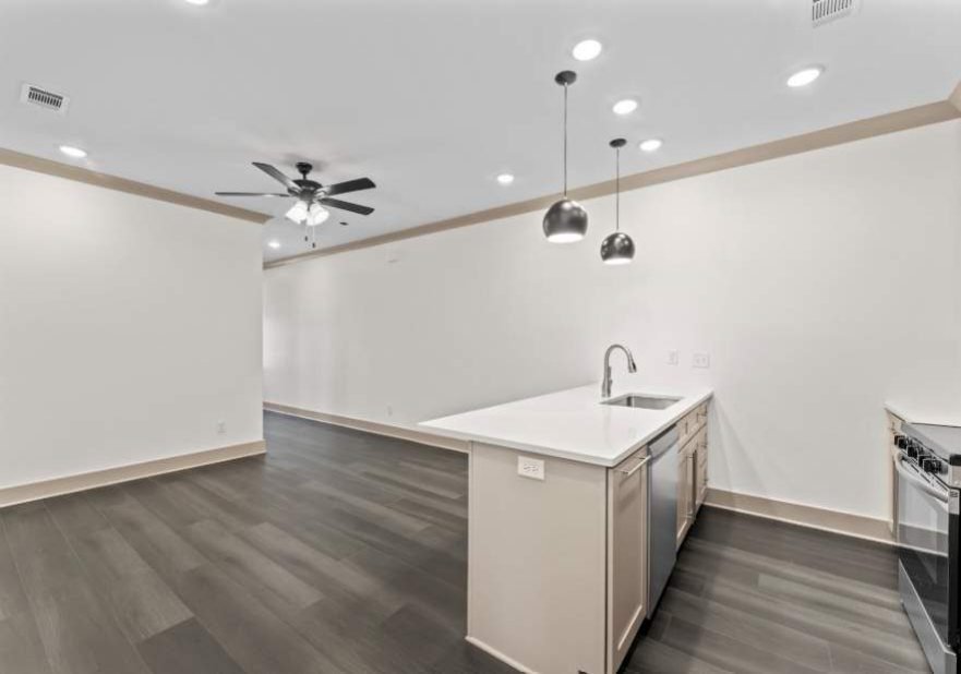 27th Street Townhouses: Open living + kitchen